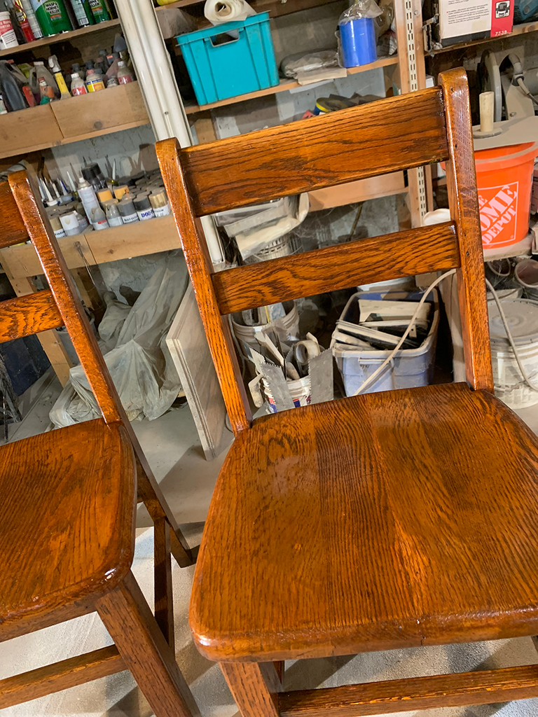 Refinished hardwood chair seat and back with restored color and a clear polyurethane finish